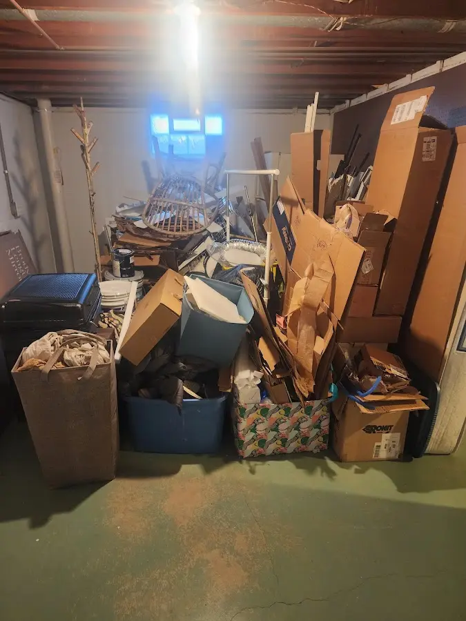 Roll-off dumpster container at job site for 15 Yard Dumpster Rental in Scottsburg